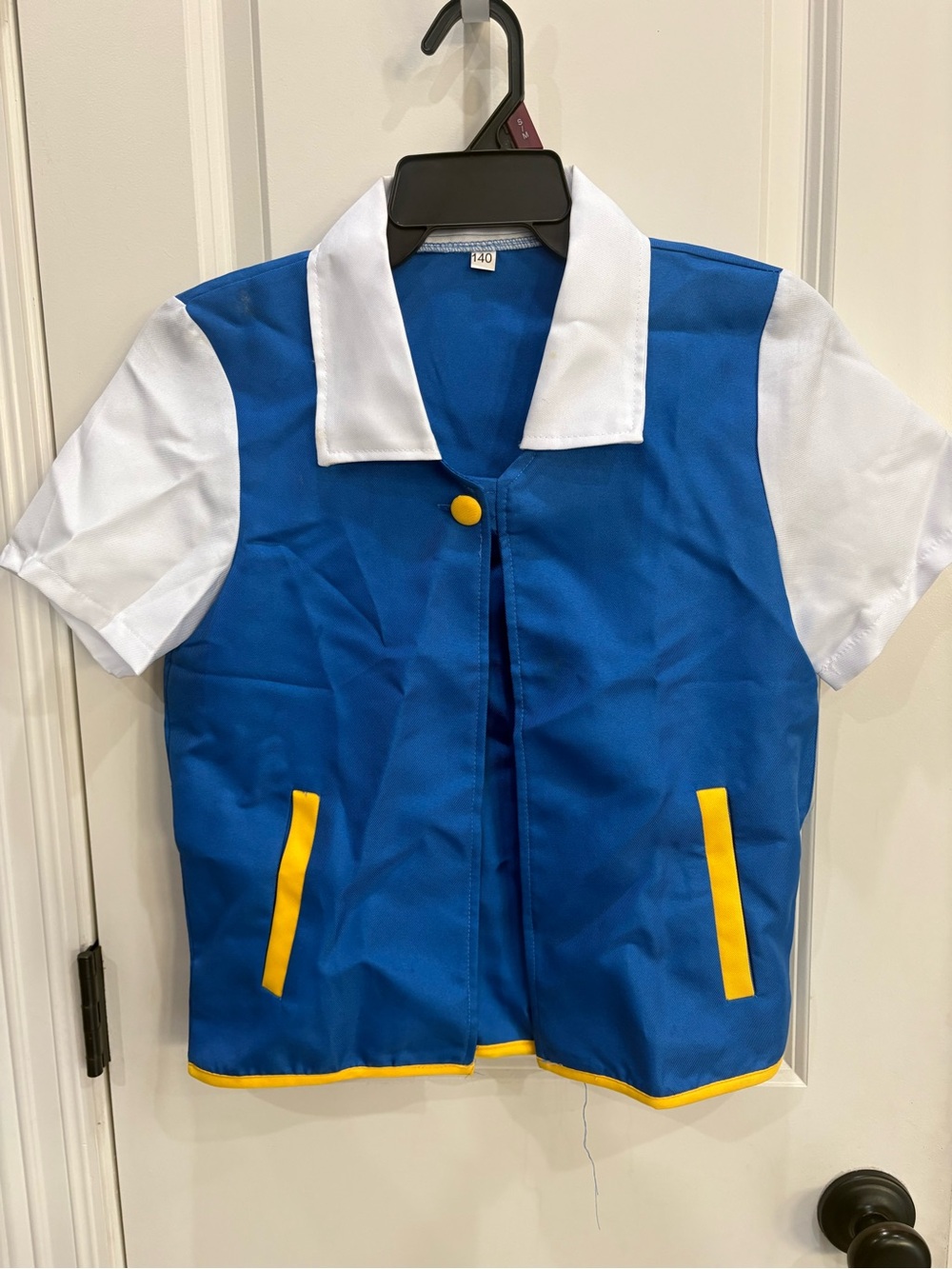 Pokémon Ash Ketchum top in size 140/9-10 year old FUC due to untreated stains
